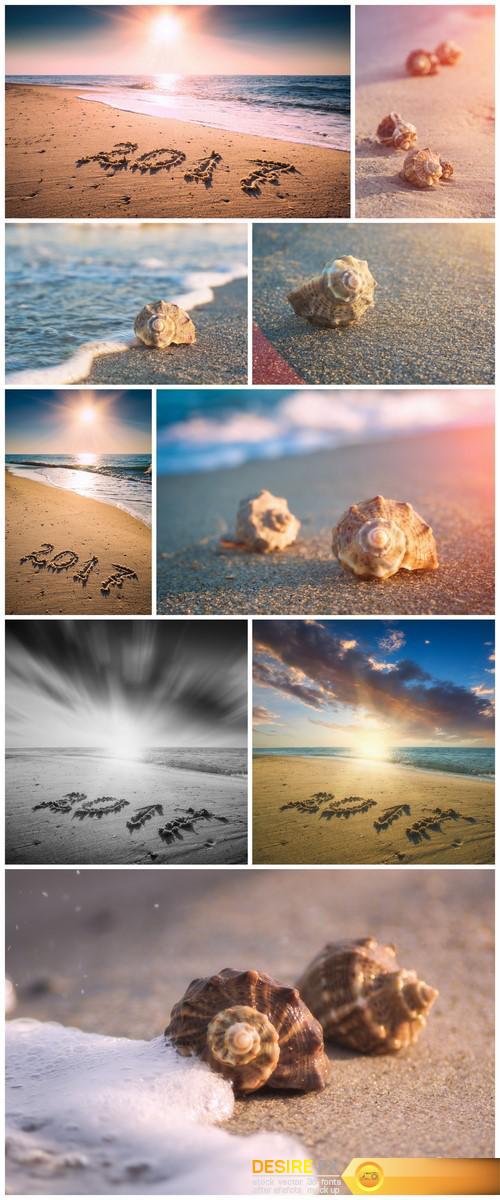2017 written in sand on a sea beach 9X JPEG