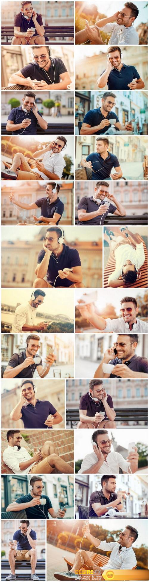 Smiling handsome guy listening to music - 24xUHQ JPEG Photo Stock