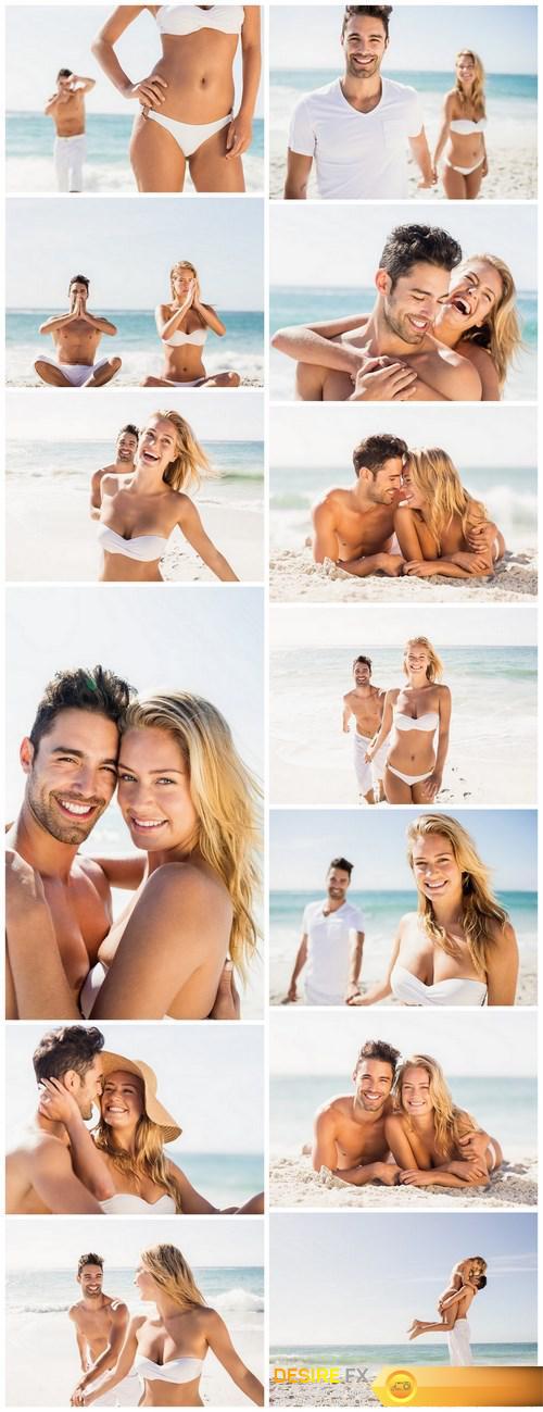 Young couple on the beach - 13xUHQ JPEG Photo Stock