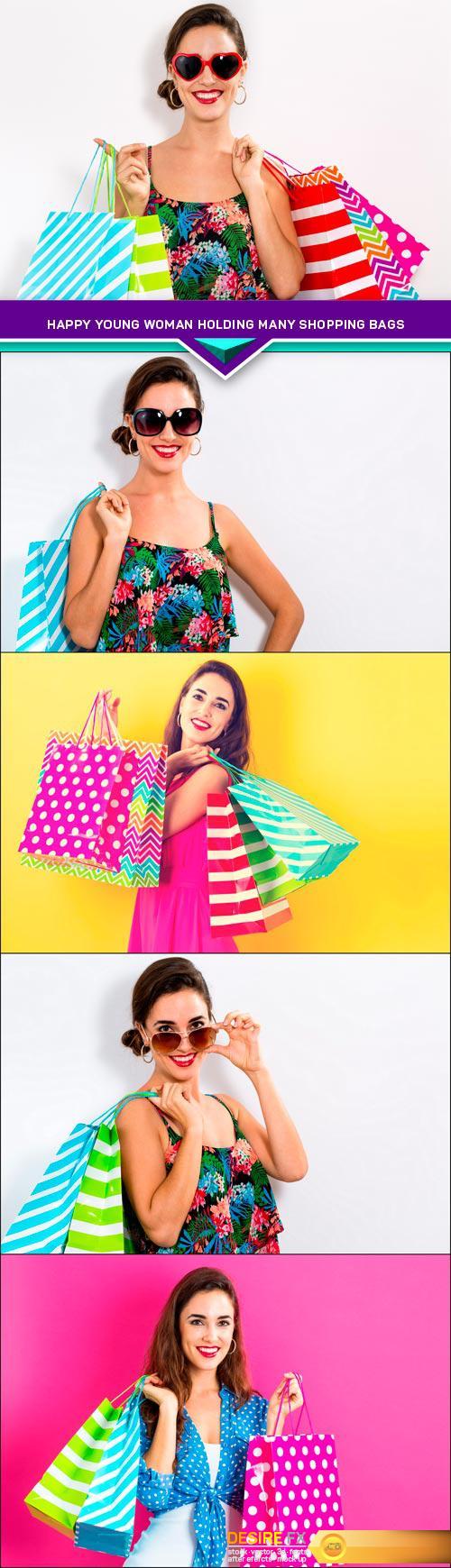 Happy young woman holding many shopping bags 5X JPEG