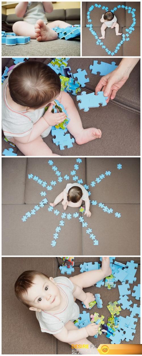Baby boy playing with puzzle 5X JPEG