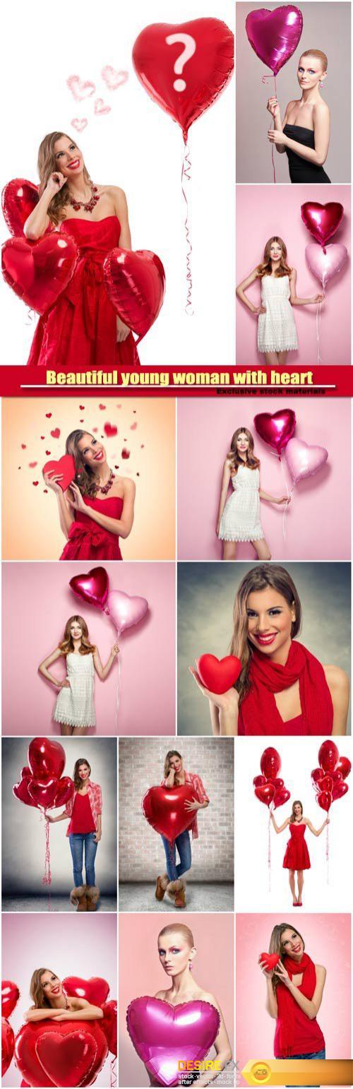 Beautiful young woman with heart shape air balloon, valentine woman