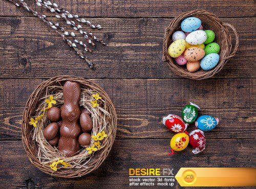 Chocolate easter eggs and sweets on wooden background 29X JPEG