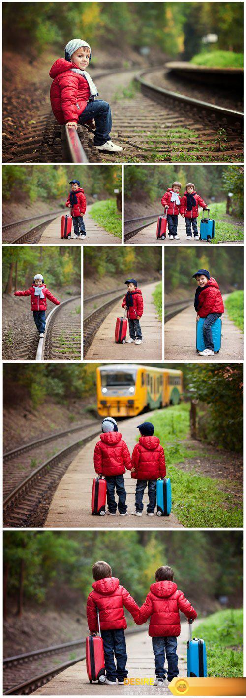 Children near the railroad, travel concept