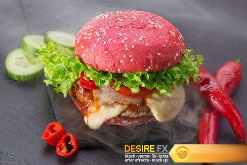Burger, sushi rolls with smoke on a black background 10X JPEG