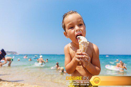 Child eating ice cream on the beach 10X JPEG
