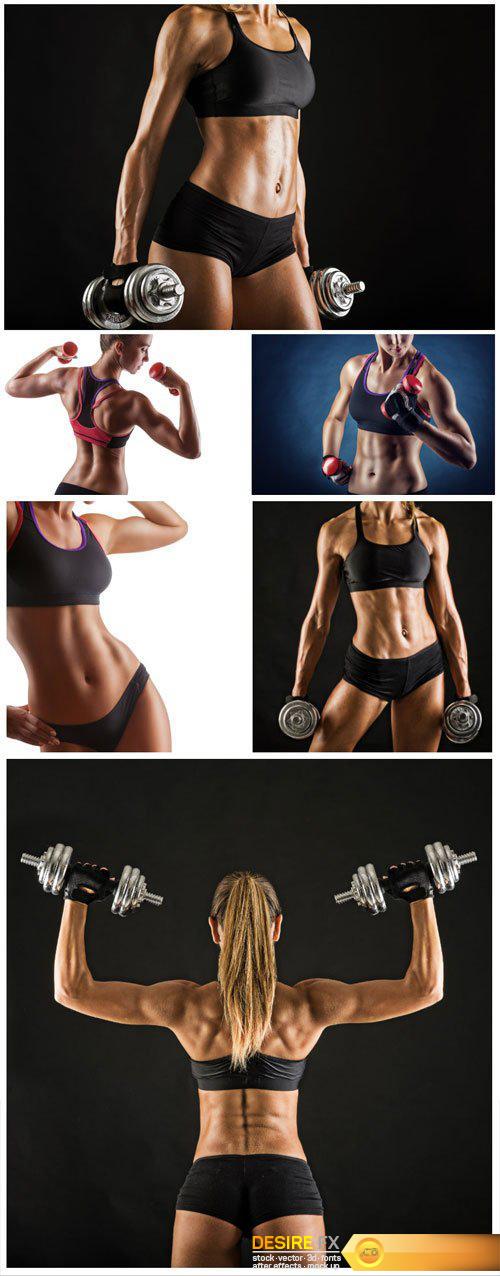 Strong beautiful woman with dumbbells, sport