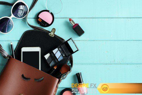 Women handbag with makeup and accessories isolated on pink background 20X JPEG