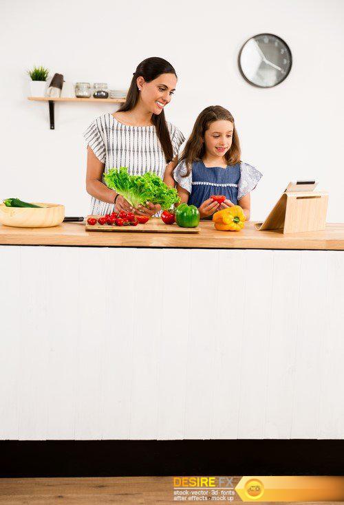 Cook in the kitchen mother and daughter 15X JPEG