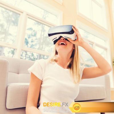Young woman using virtual reality headset, 15 x UHQ JPEG