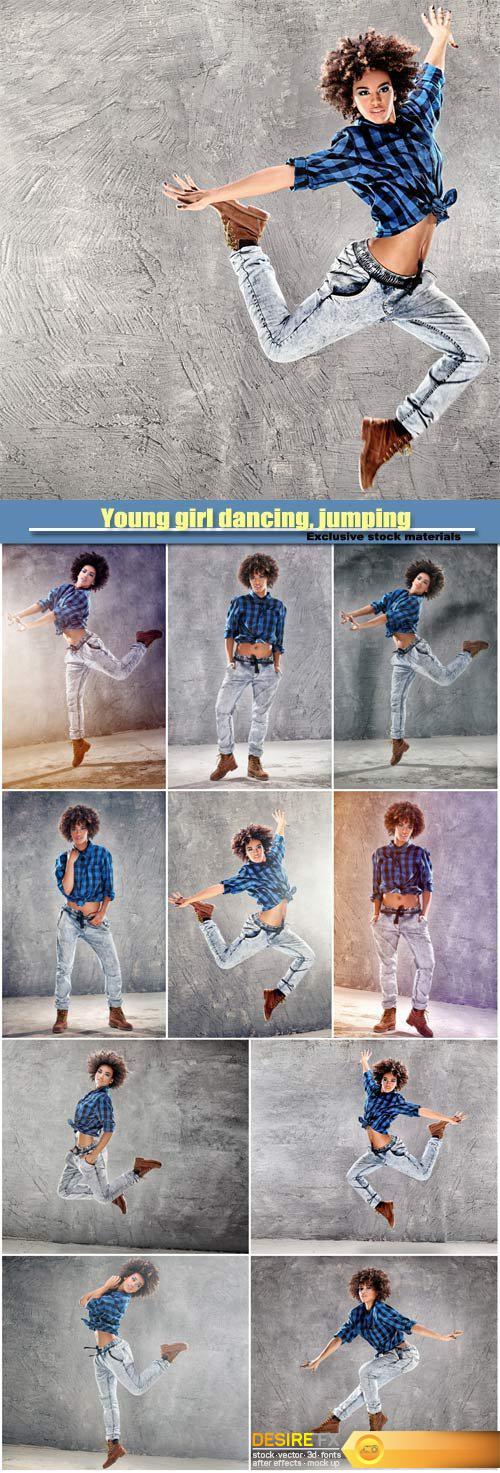 Young girl dancing, jumping