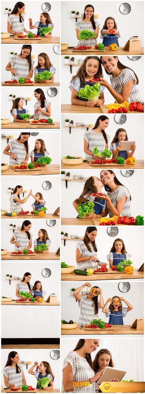 Cook in the kitchen mother and daughter 15X JPEG