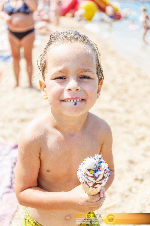 Child eating ice cream on the beach 10X JPEG