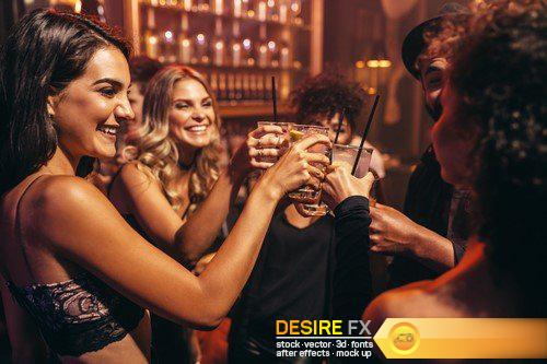 Group of friends enjoying drinks at bar 20X JPEG