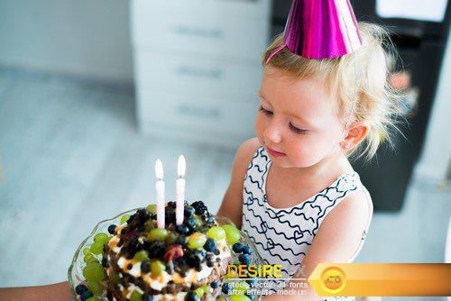 Mother with her cute daughter and birthday cake with candle 9X JPEG