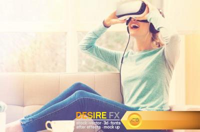 Young woman using virtual reality headset, 15 x UHQ JPEG