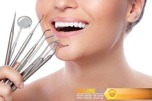 Happy smiling beautiful young woman cleaning skin by cotton pad, smiling woman and dental tools