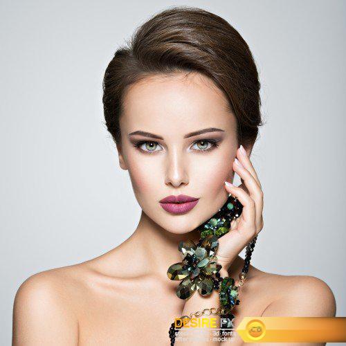 Beautiful fashionable woman with jewelry