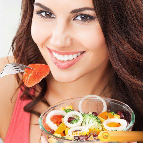 Brunette woman with vegetarian vegetable salad 7X JPEG