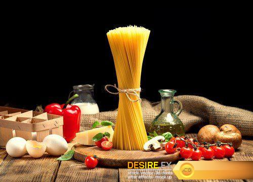 Ingredients for cooking pasta on wooden board with Italian spaghetti 14X JPEG
