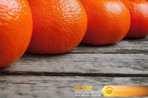 Oranges, kiwi on wooden table 8X JPEG