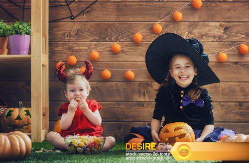 Children and pumpkins on Halloween