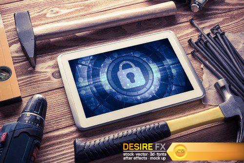 Web security and technology concept with tablet pc on wooden tab 9X JPEG