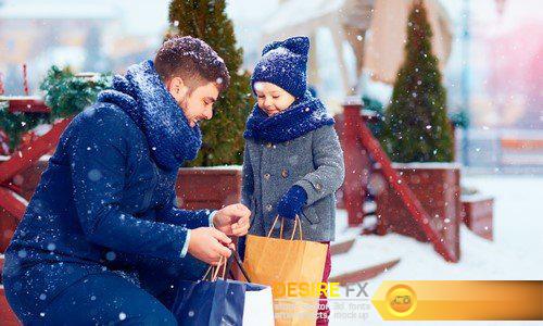 Happy family having fun under winter snow 7X JPEG