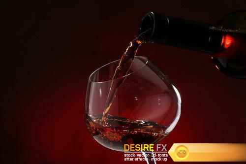 Red wine pouring into wine glass, close-up 20X JPEG