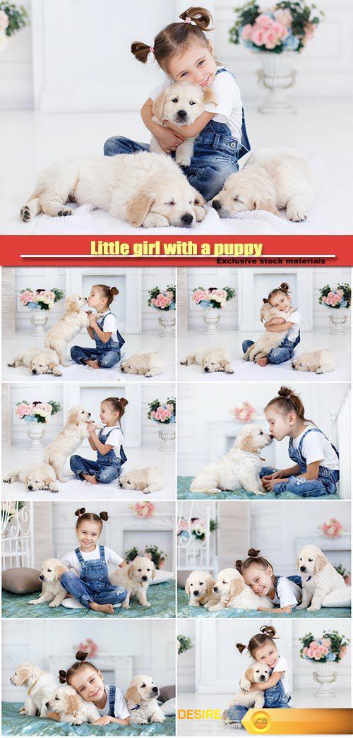 Little girl with a puppy