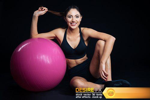 Beautiful young fitness woman sitting and posing - 26 UHQ JPEG