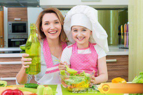 Attractive happy mother and daughter baking - 25 UHQ JPEG