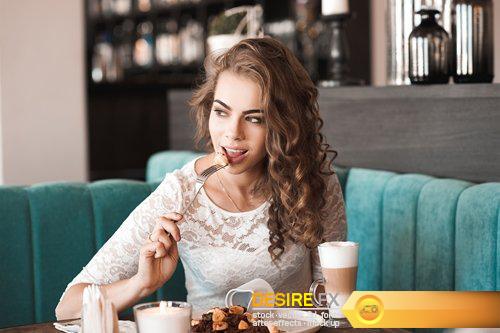 Beautiful blonde woman drinking coffee in cafe - 7 UHQ JPEG