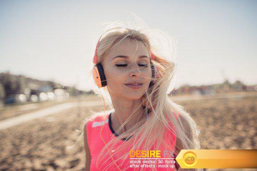 Beautiful woman listening to music - 11 UHQ JPEG