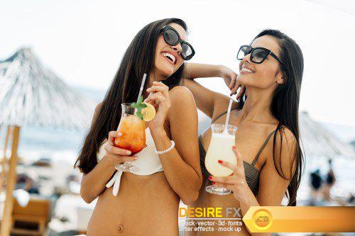 Beautiful girls drinking cocktails on beach - 10 UHQ JPEG