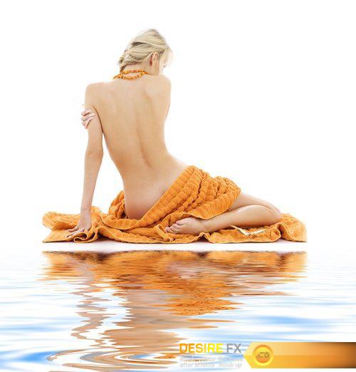 Beautiful lady in spa with orange towels and snowflakes - 26 UHQ JPEG