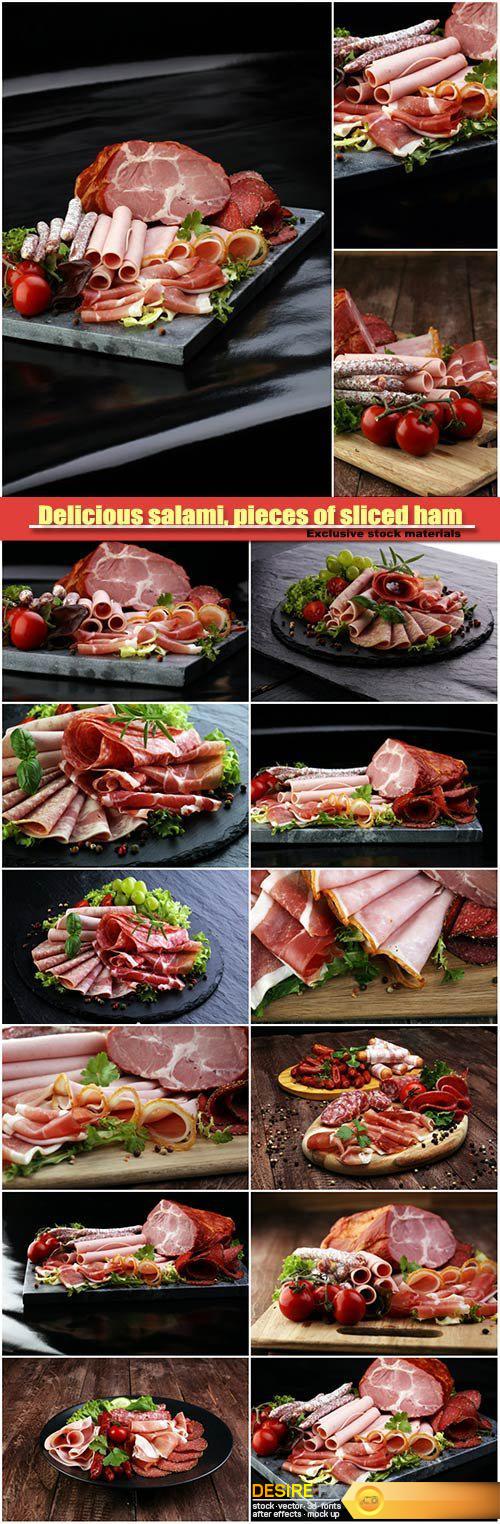 Delicious salami, pieces of sliced ham, sausage, tomatoes, salad and vegetable