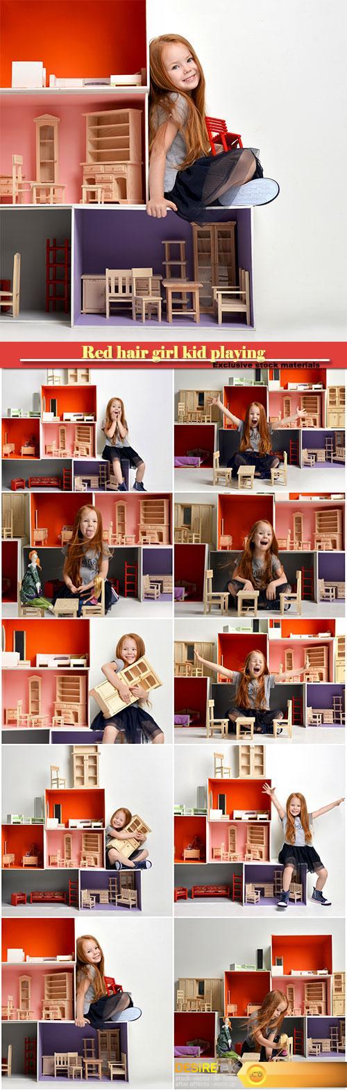 Red hair baby girl kid playing with dollhouse stuffed with mini furniture toys
